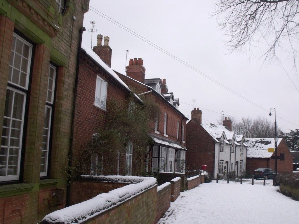 Snow on a street of old brick houses in Yardley, Birmingham